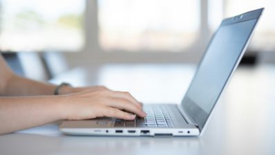 Person working on a laptop.