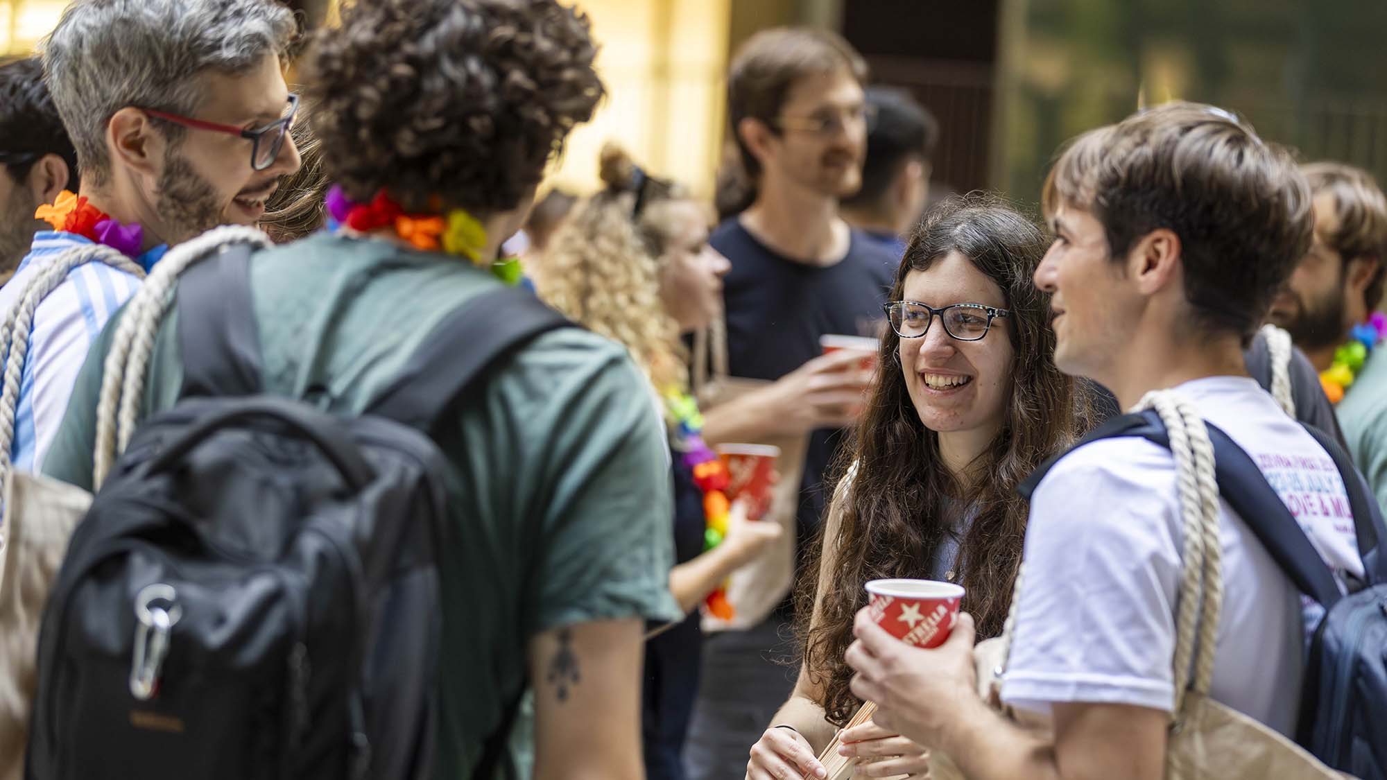A group of residents chatting in the PRBB’s inner square.